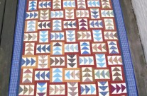 Ginny’s Plaid Flying Geese Quilt