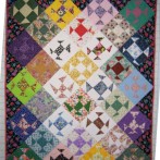 Michelle’s Wonky Fly quilt finished!