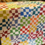 rho’s quilt made of wonky checkerboard blocks…