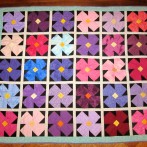 African Violets lap quilt