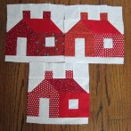 Three red schoolhouses to enter