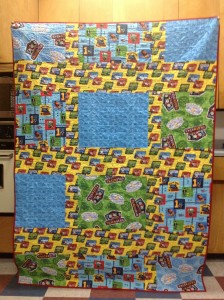 Remi loves trains and Thomas and Friends. I found Thomas and Friends FQ' on clearance and added some Thomas and Friends yardage to make it big enough for the backing.