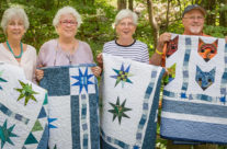 April 2015 Made Fabric Star Blocks into sibling quilts