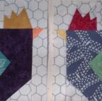 Two bright-ish roosters