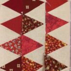 3 sets of red triangles